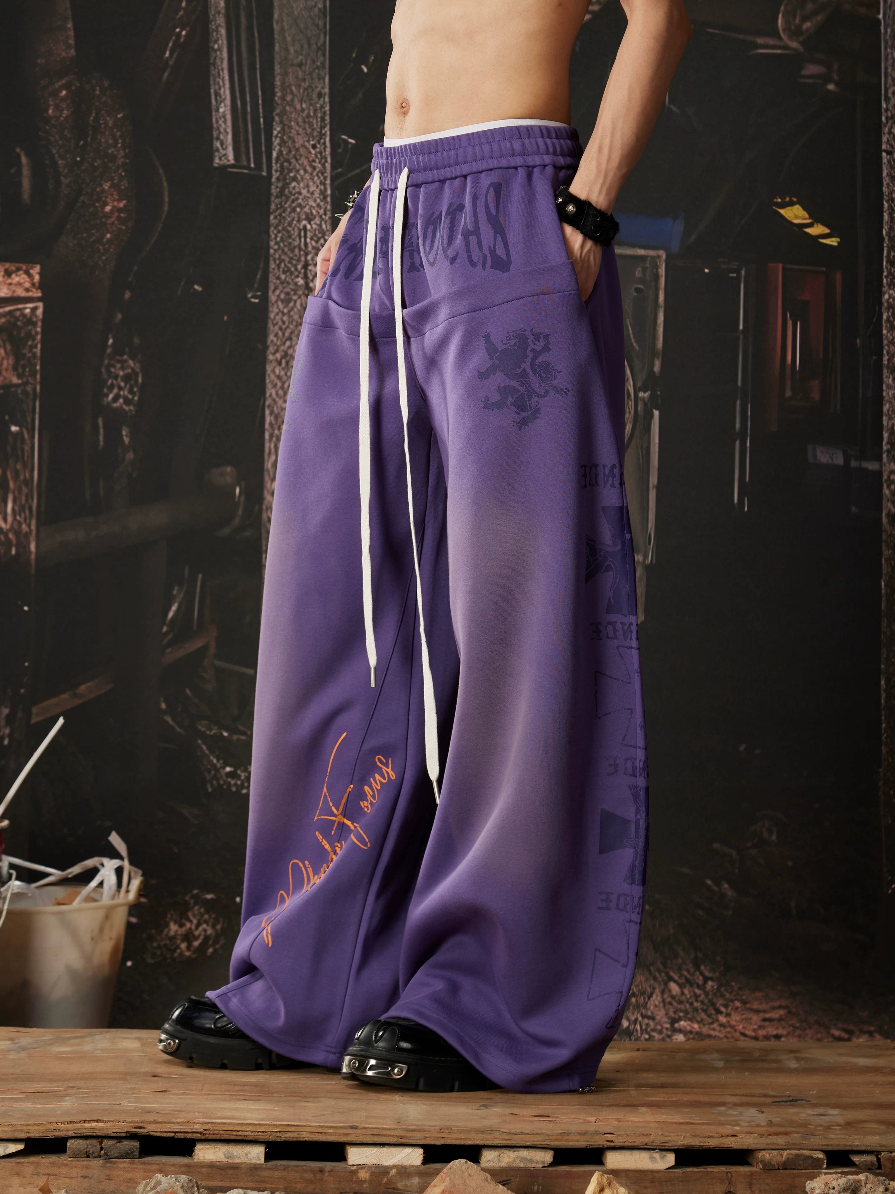 NOMANIAI Light-toned totem print Y2K loose-fit casual pants.