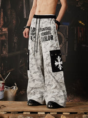 NOMANIAI Camo Multi-Pocket Printed Curved-Seam Cargo Pants.
