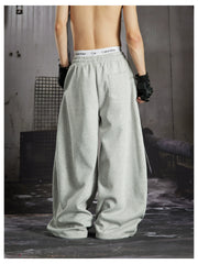 NOMANIAI  Distressed Union Jack star-print loose-fit casual sweatpants with an elastic waist.