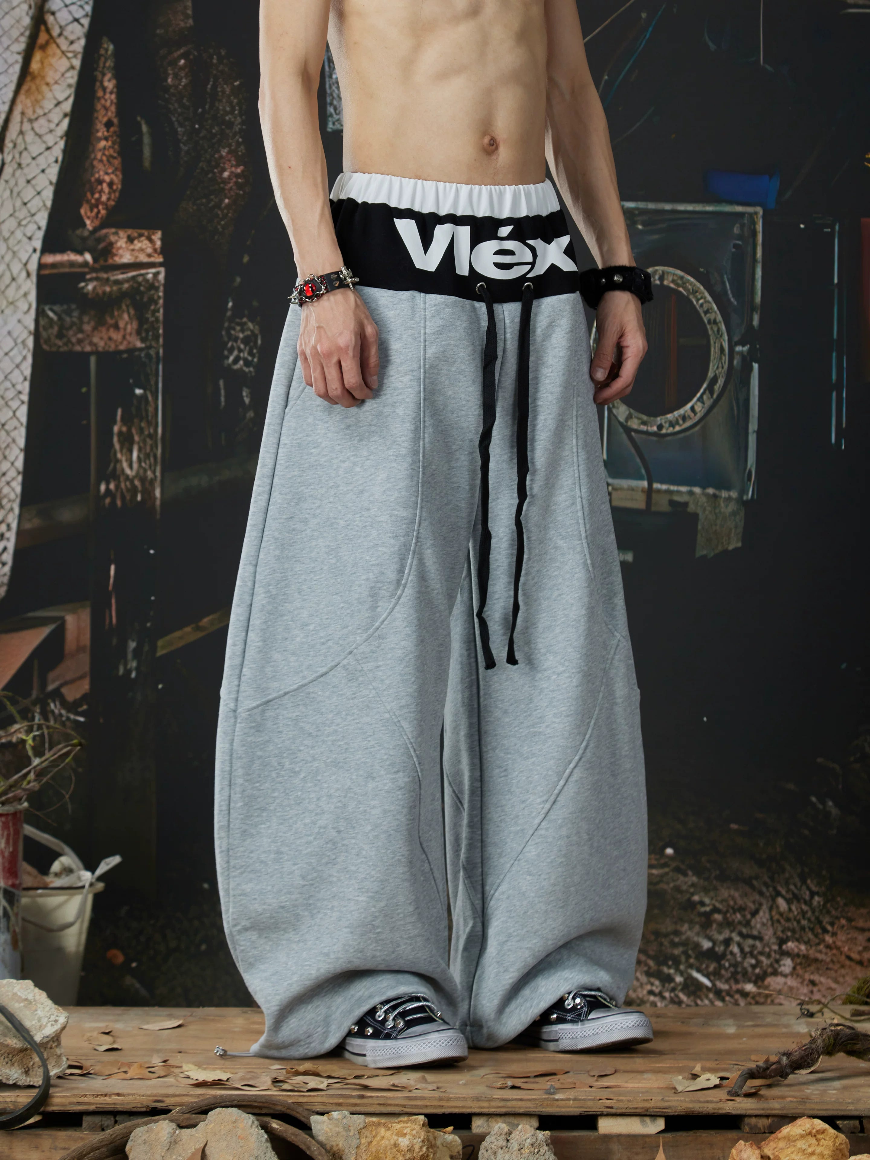 NOMANIAI  Street-style double-waistband sweatpants with attached skirt detail – casual dance pants.