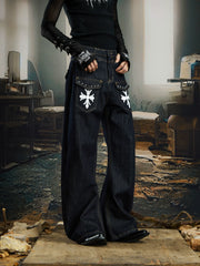 NOMANIAI  Printed, studded, deconstructed "Scimitar" jeans—versatile trousers.