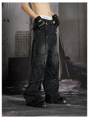 NOMANIAI  Panel-construction straight-leg jeans with rivets and a distressed wash.