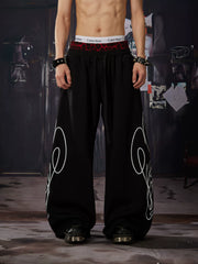 NOMANIAI Y2K-style loose-fit casual pants with leopard print and totem motifs.