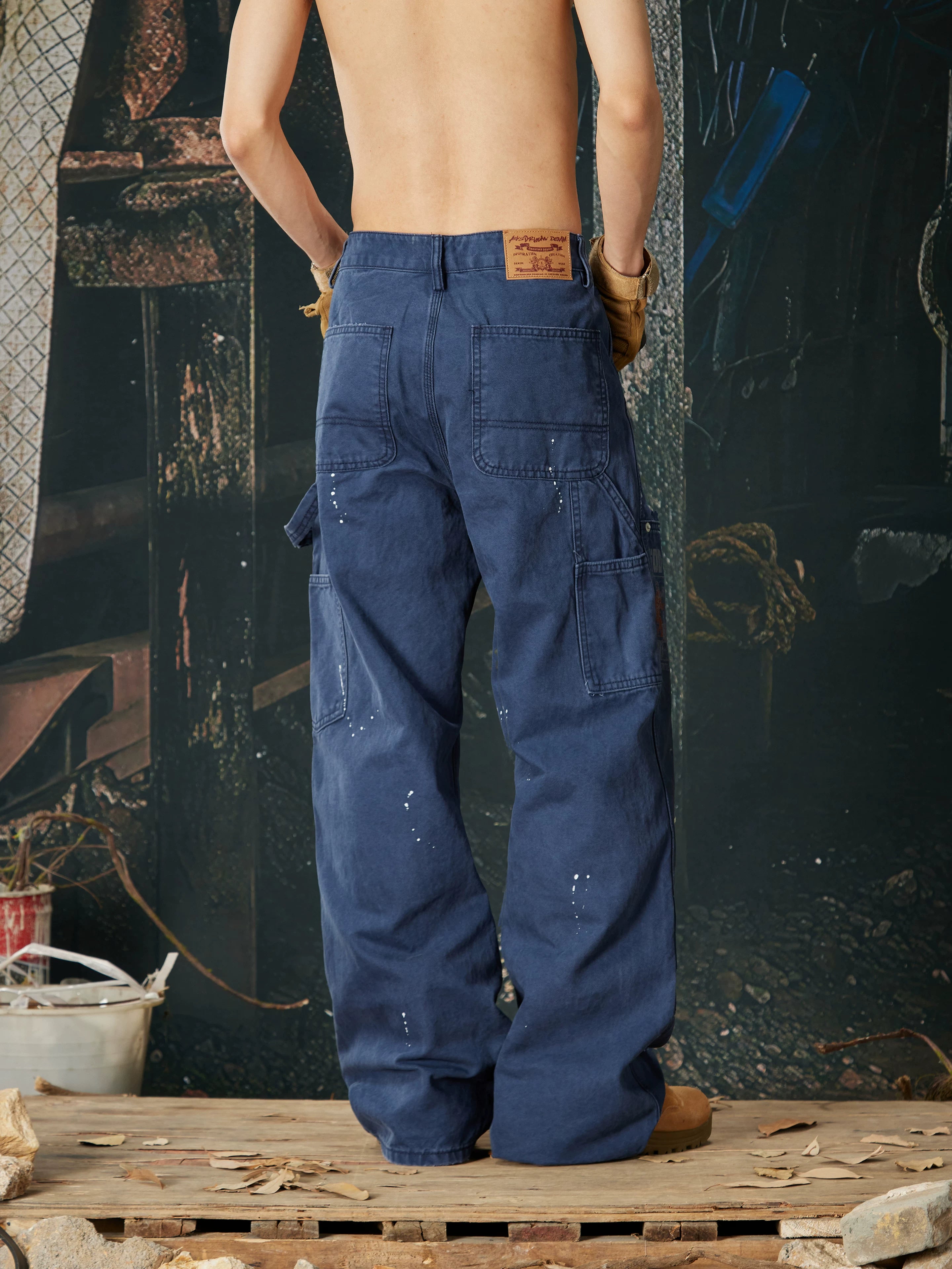 NOMANIAI Multi-process distressed casual cargo pants.