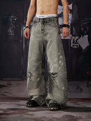 NOMANIAI  Distressed, washed, and vintage-look loose wide-leg jeans.