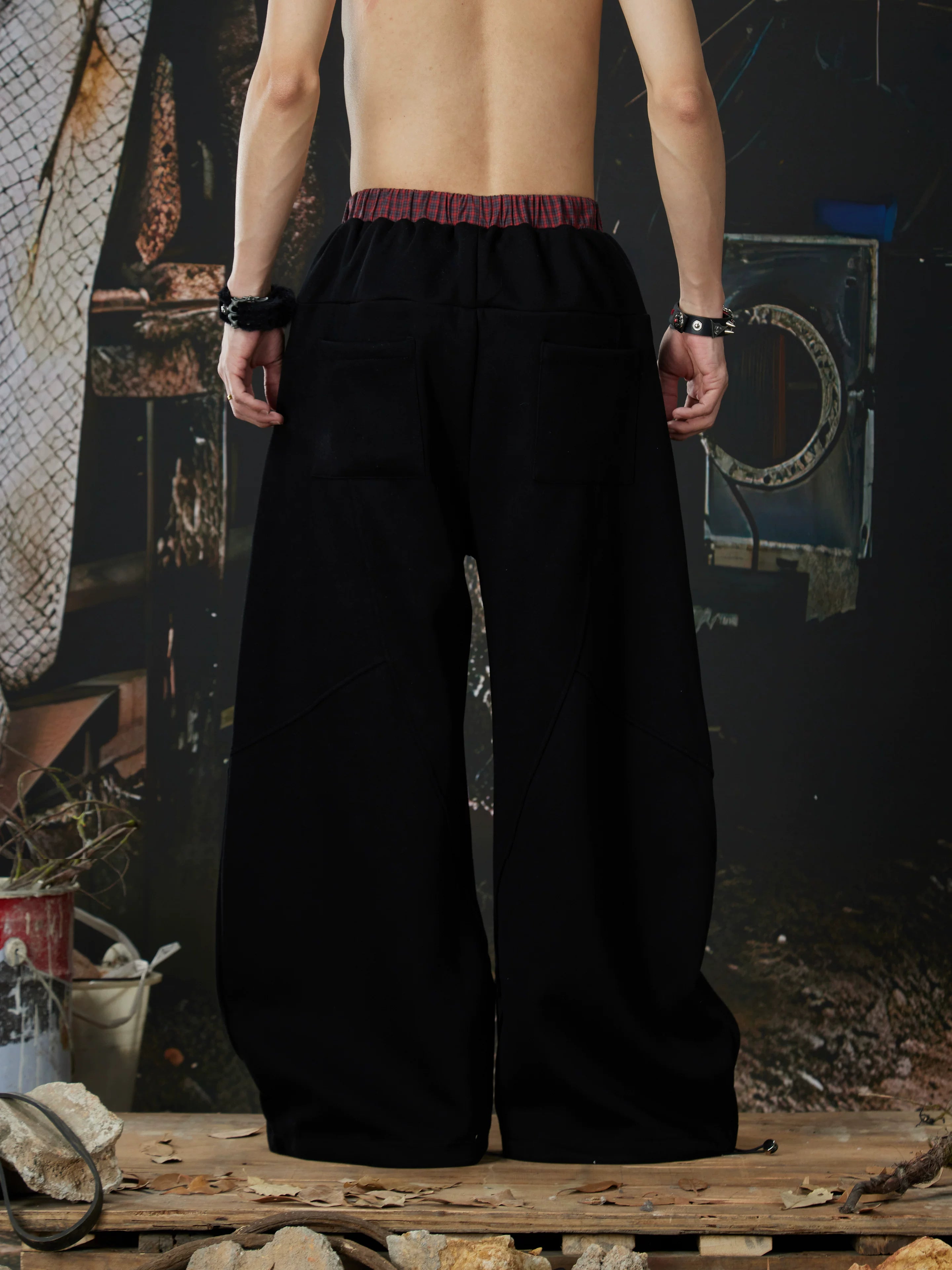 NOMANIAI  Street-style double-waistband sweatpants with attached skirt detail – casual dance pants.