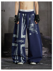 NOMANIAI  Distressed Union Jack star-print loose-fit casual sweatpants with an elastic waist.