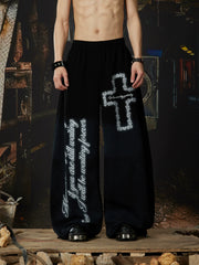 NOMANIAI Elastic-waist casual curved-leg trousers with cross-motif print.