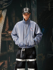 NOMANIAI Glossy-finish custom embroidered zip-up jacket.