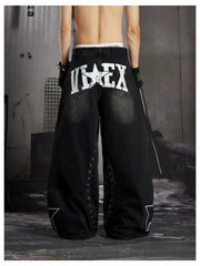NOMANIAI  Hand-painted star and stud detail wide-leg jeans with a washed, distressed finish.