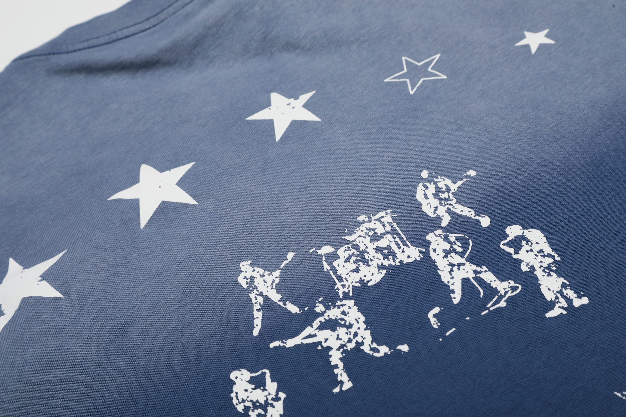 Omirad “Star Fade Back Graphic Tee”