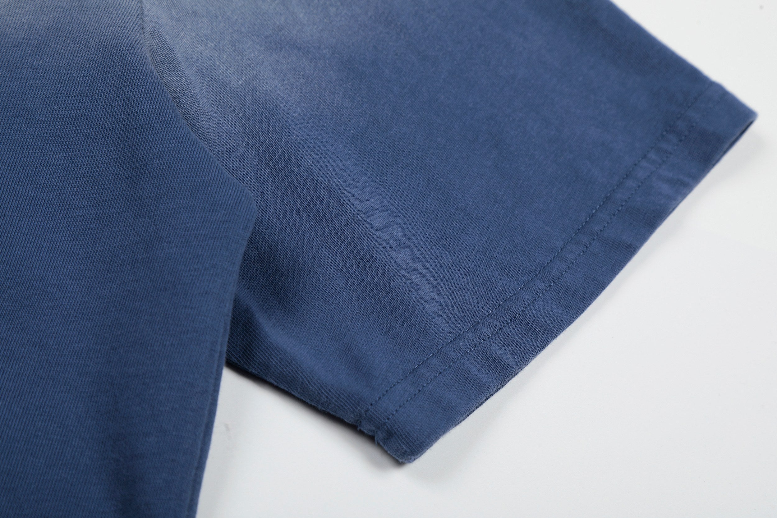 Omirad “Star Fade Back Graphic Tee”